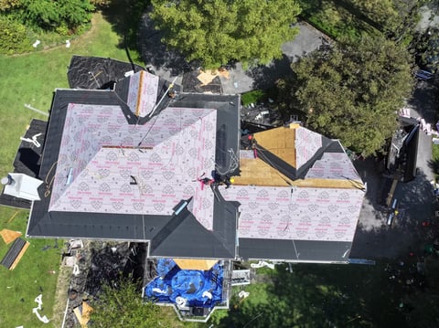 Residential roof replacement in progress